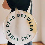 Read Between The Lines Circle Tote Bag